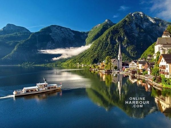 Boat Austria mountain lake summer_Online Harbour